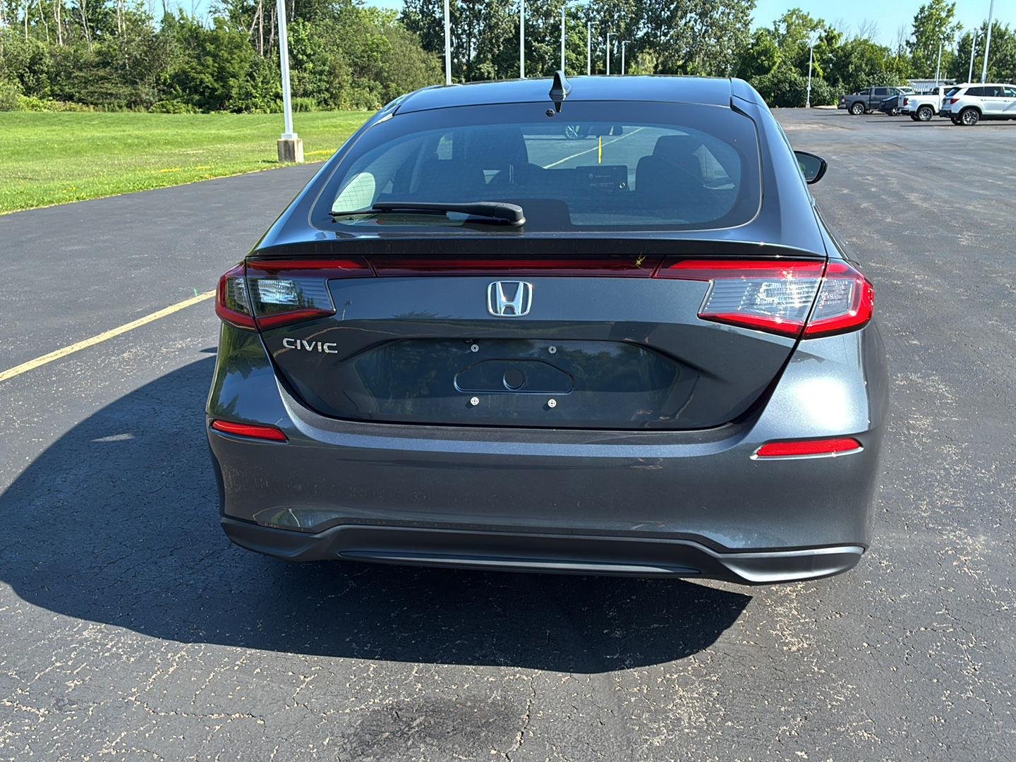 Used 2023 Meteorite Gray Metallic Honda LX image 16