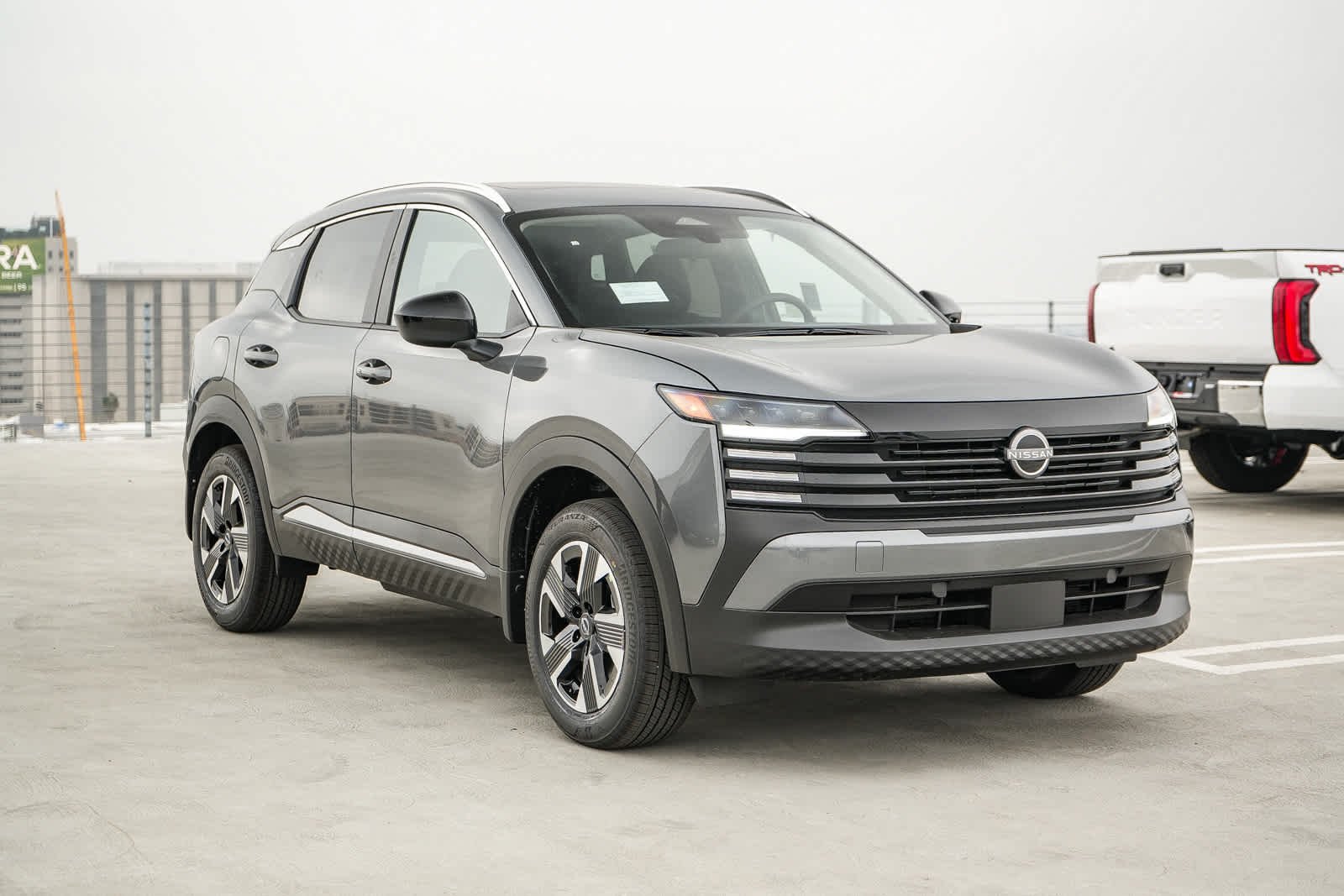 New 2027 Gun Metallic Nissan SV image 3