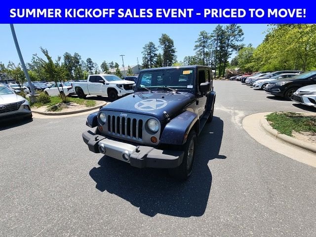 Used 2013 Blue Jeep Unlimited Sport image 5