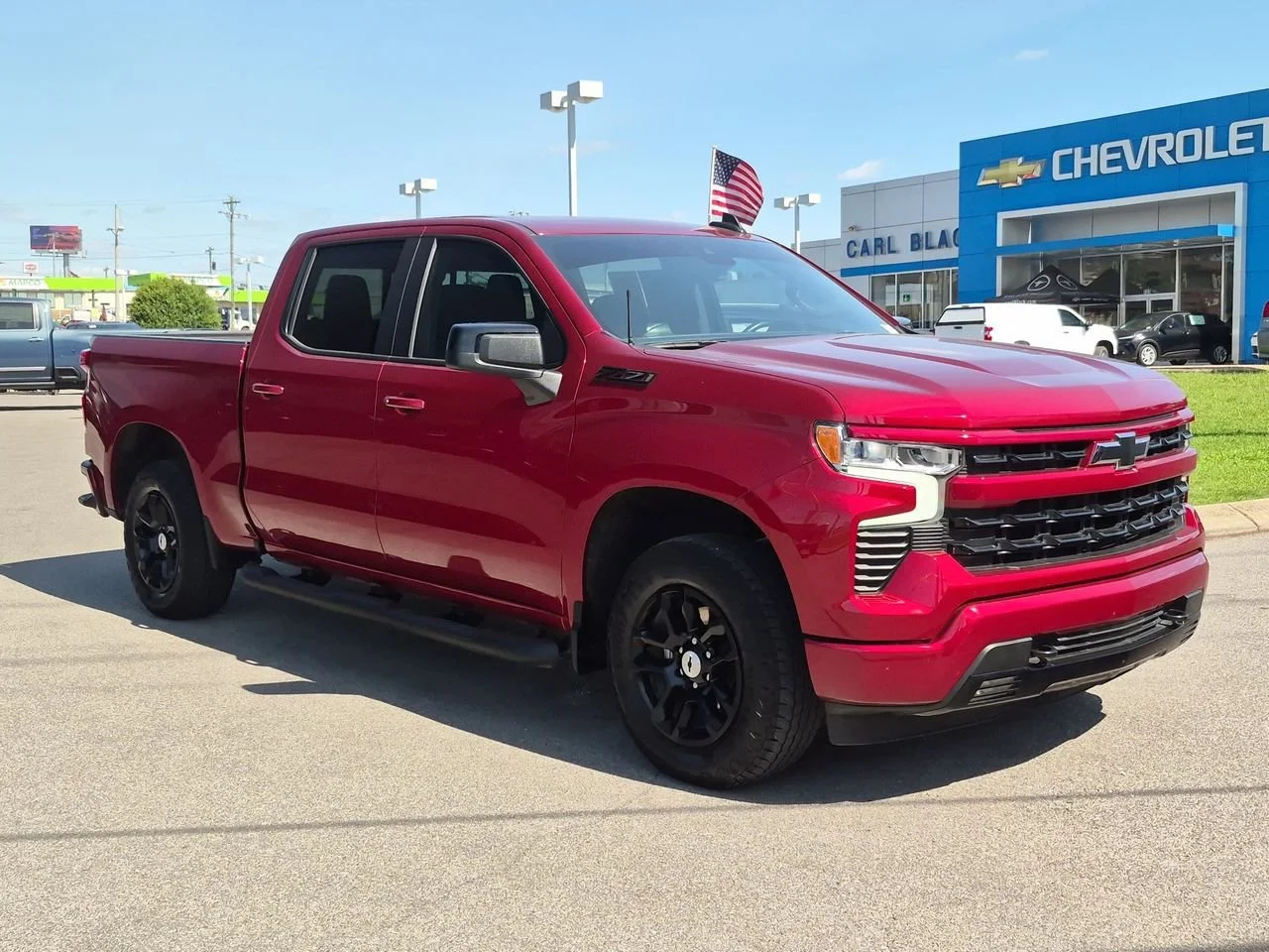 Used 2025 Radiant Red Tintcoat Chevrolet RST image 2