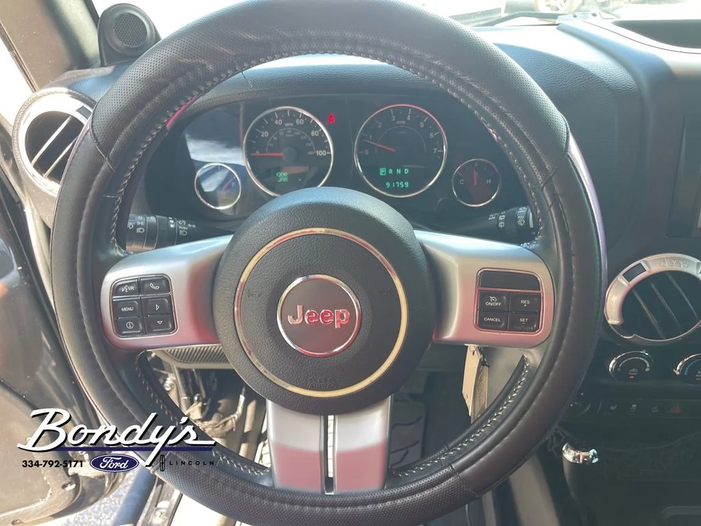 Used 2013 Black Clearcoat Jeep Unlimited Sport image 7