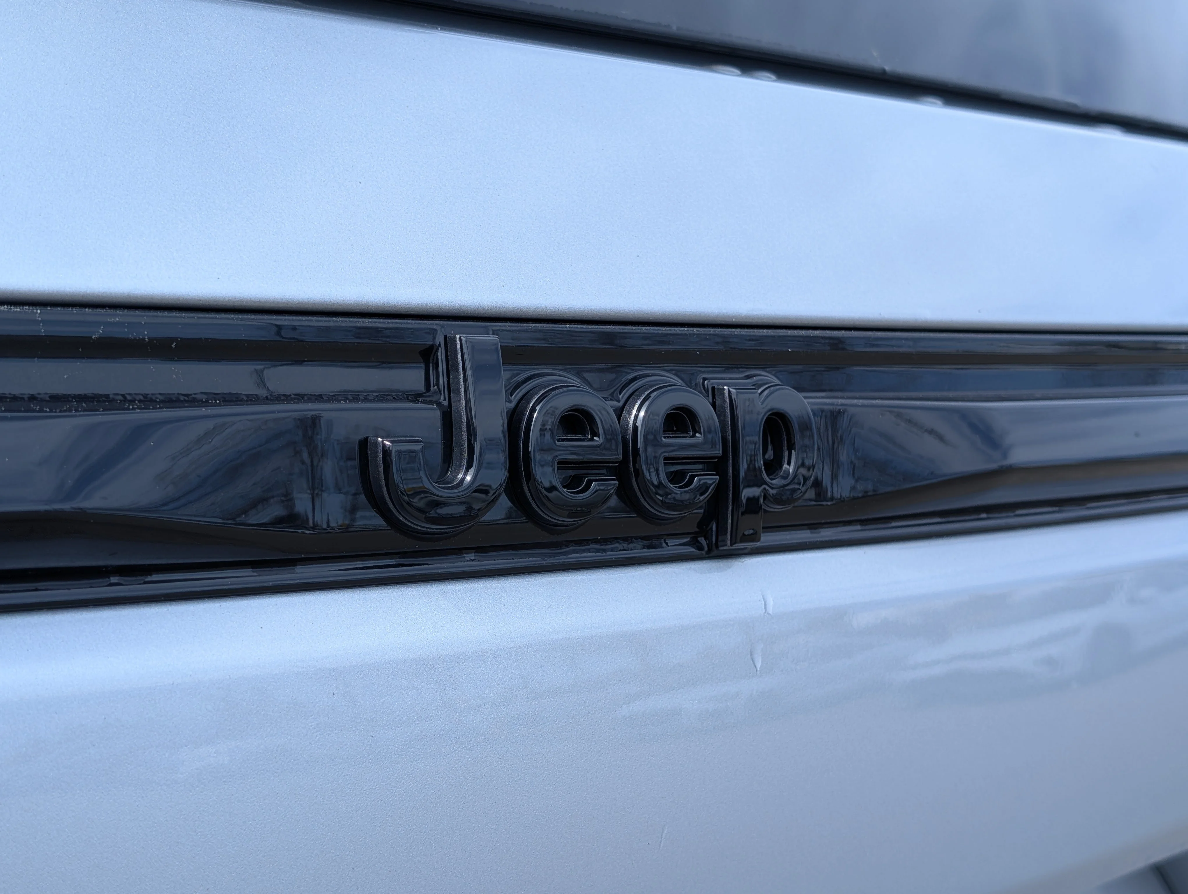 New 2025 Silver Zynith Jeep Altitude image 14