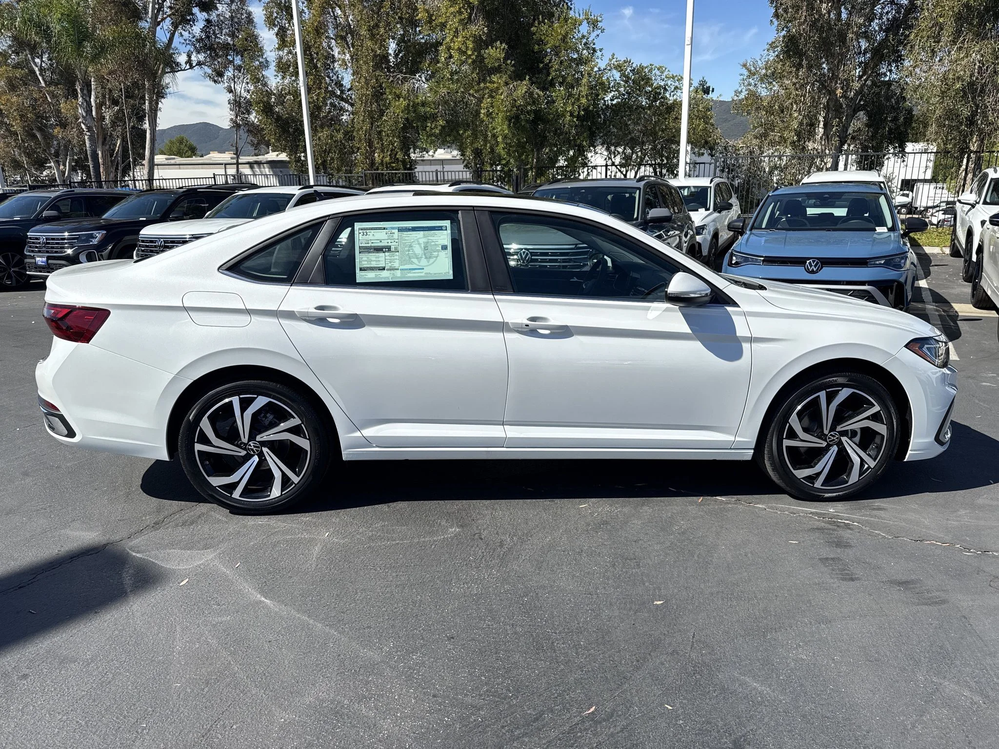 New 2026 Opal White Pearl Volkswagen SEL image 9