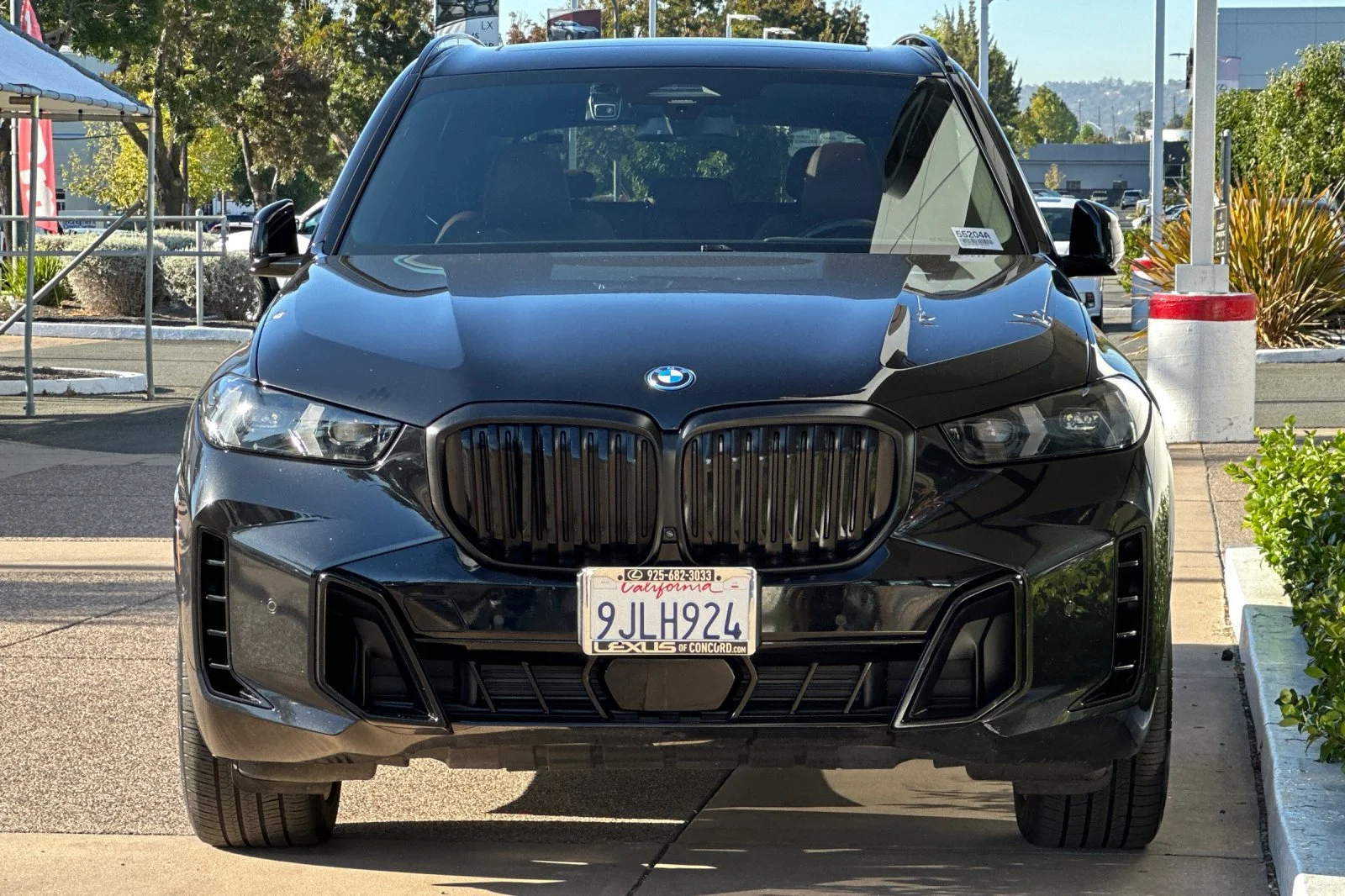 Used 2024 Black Sapphire Metallic BMW xDrive50e image 6