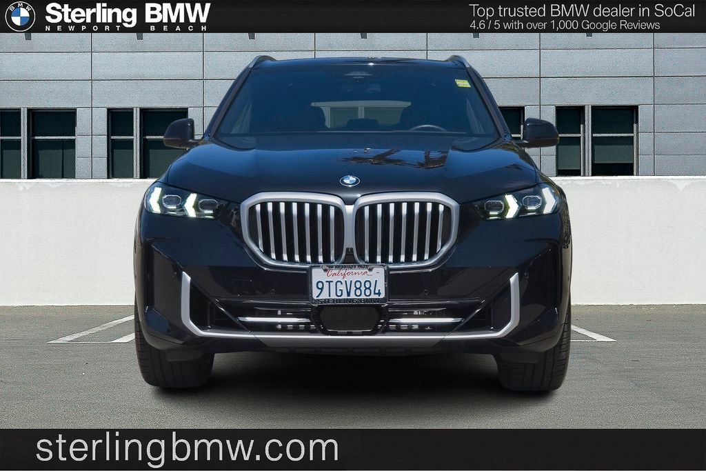 Used 2026 Black Sapphire Metallic BMW sDrive40i image 3