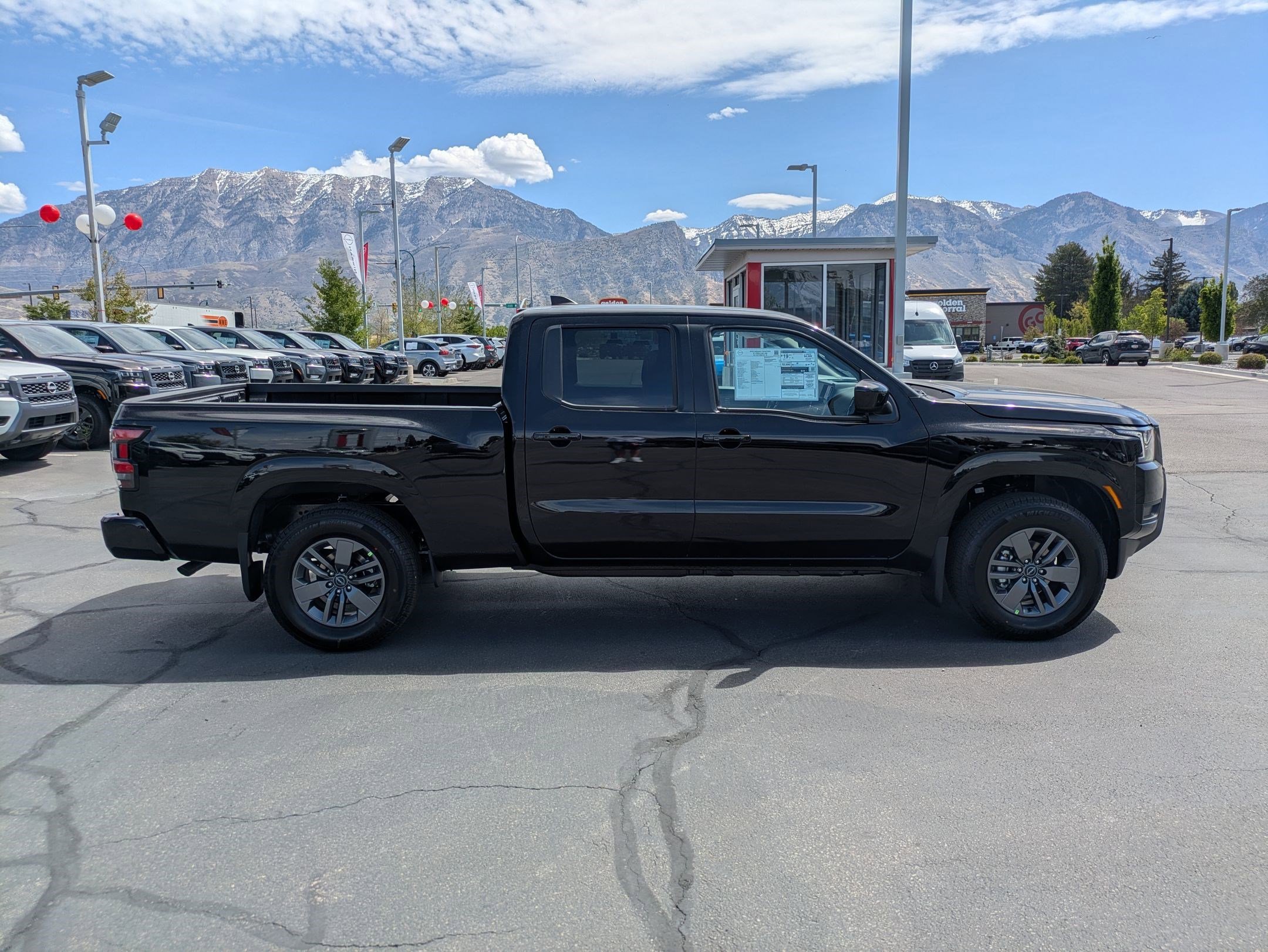 New 2026 Super Black Nissan Crew Cab SV Long Bed image 2
