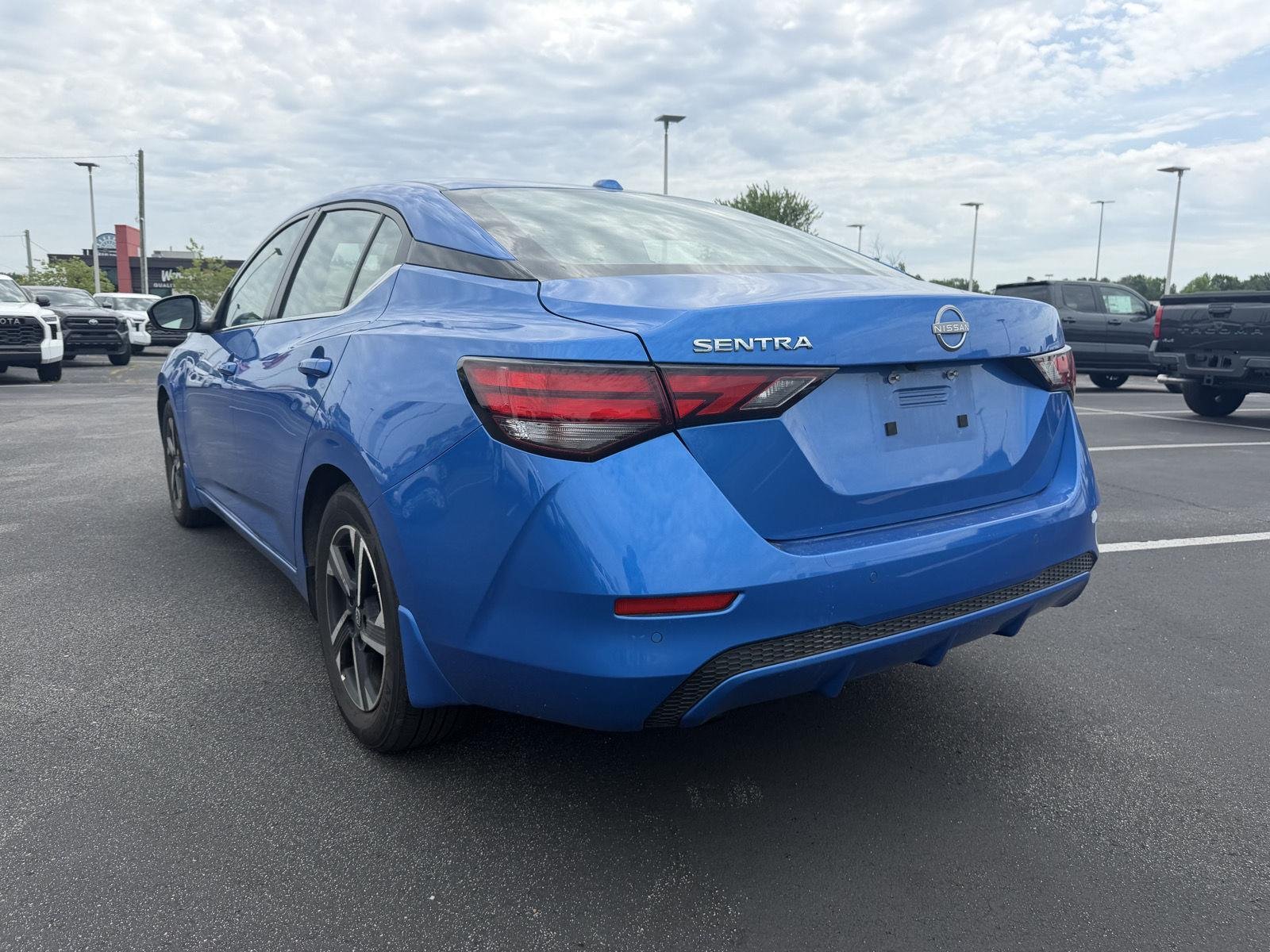 Used 2025 Electric Blue Metallic Nissan SV image 5