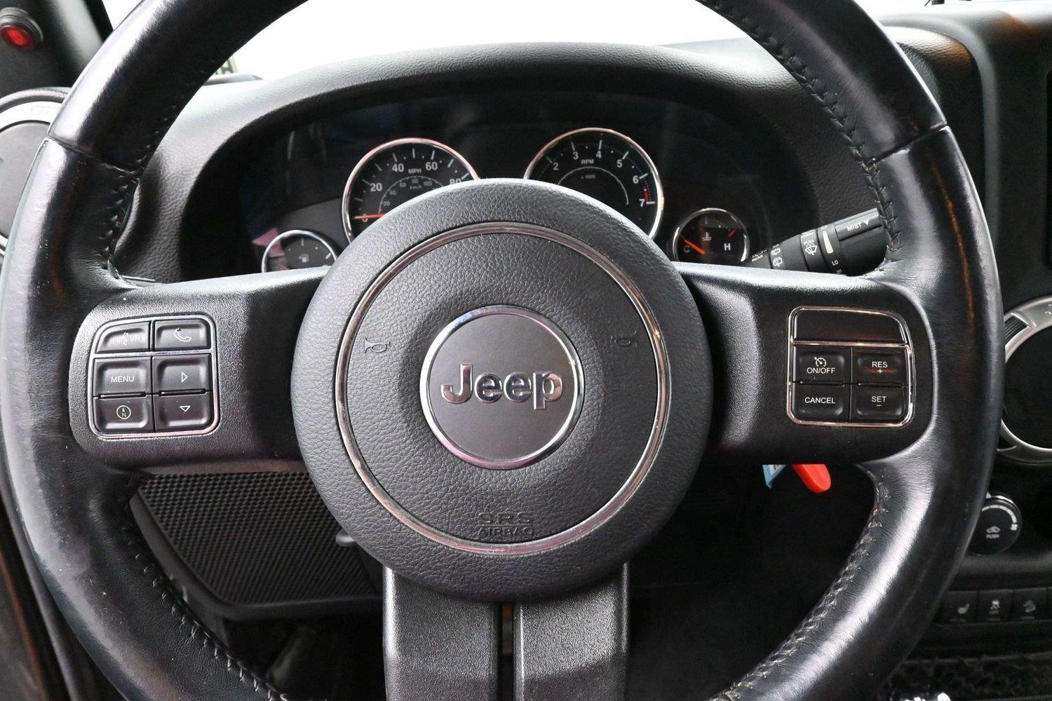 Used 2016 Granite Crystal Metallic Jeep Rubicon image 14