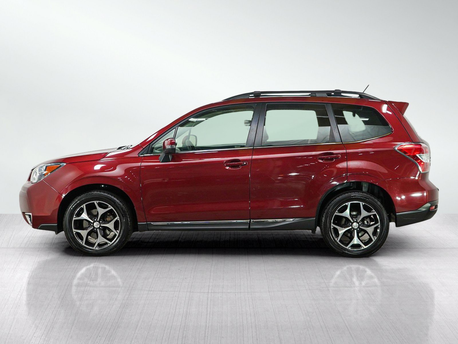 Used 2015 Subaru Forester XT Touring with VIN JF2SJGUC4FH461345 for sale in Burnsville, Minnesota