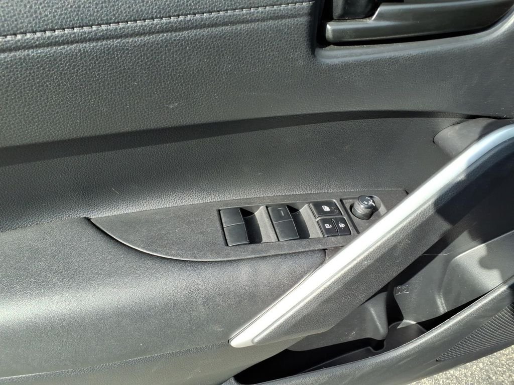Used 2024 Sonic Silver/Jet Black Toyota Hybrid SE image 11