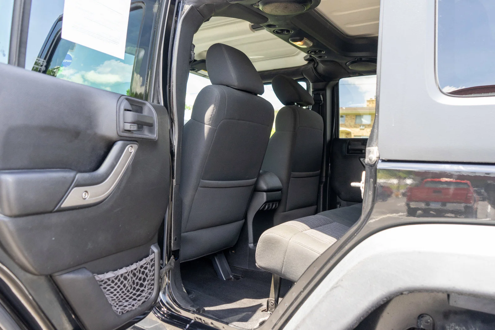 Used 2012 Black Clearcoat Jeep Unlimited Sport image 23