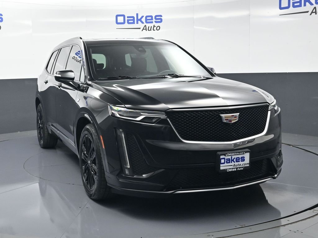 Used 2023 Stellar Black Metallic Cadillac Sport image 2