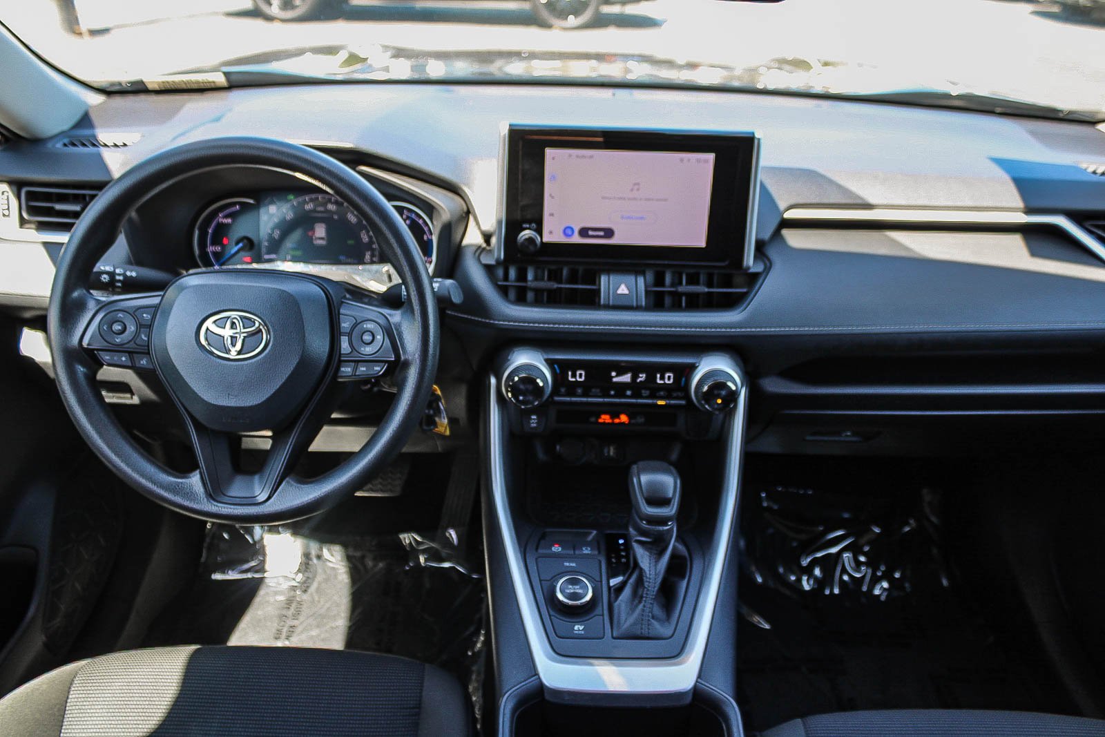 Used 2024 Midnight Black Metallic Toyota Hybrid LE image 13