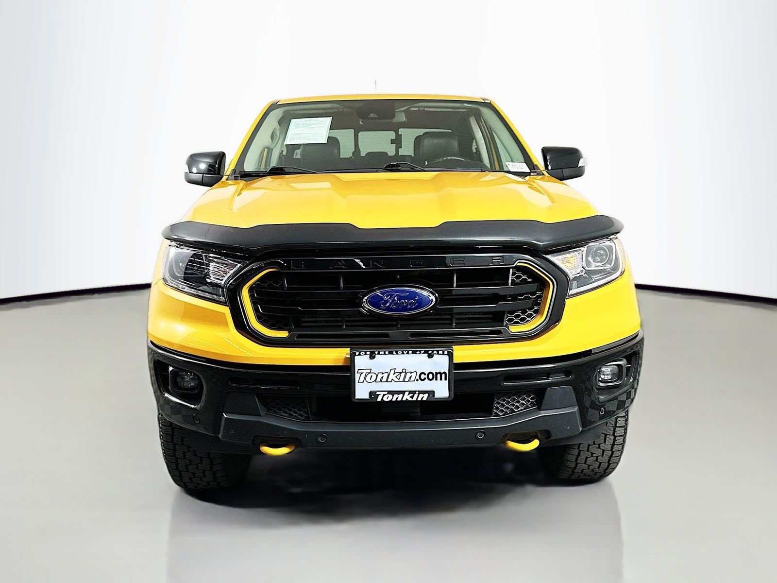 Used 2022 Cyber Orange Metallic Tricoat Ford Lariat image 1