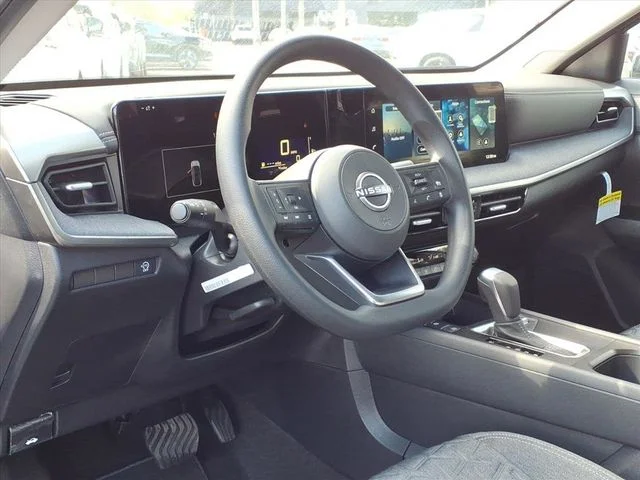 New 2026 Gun Metallic Nissan SV image 9