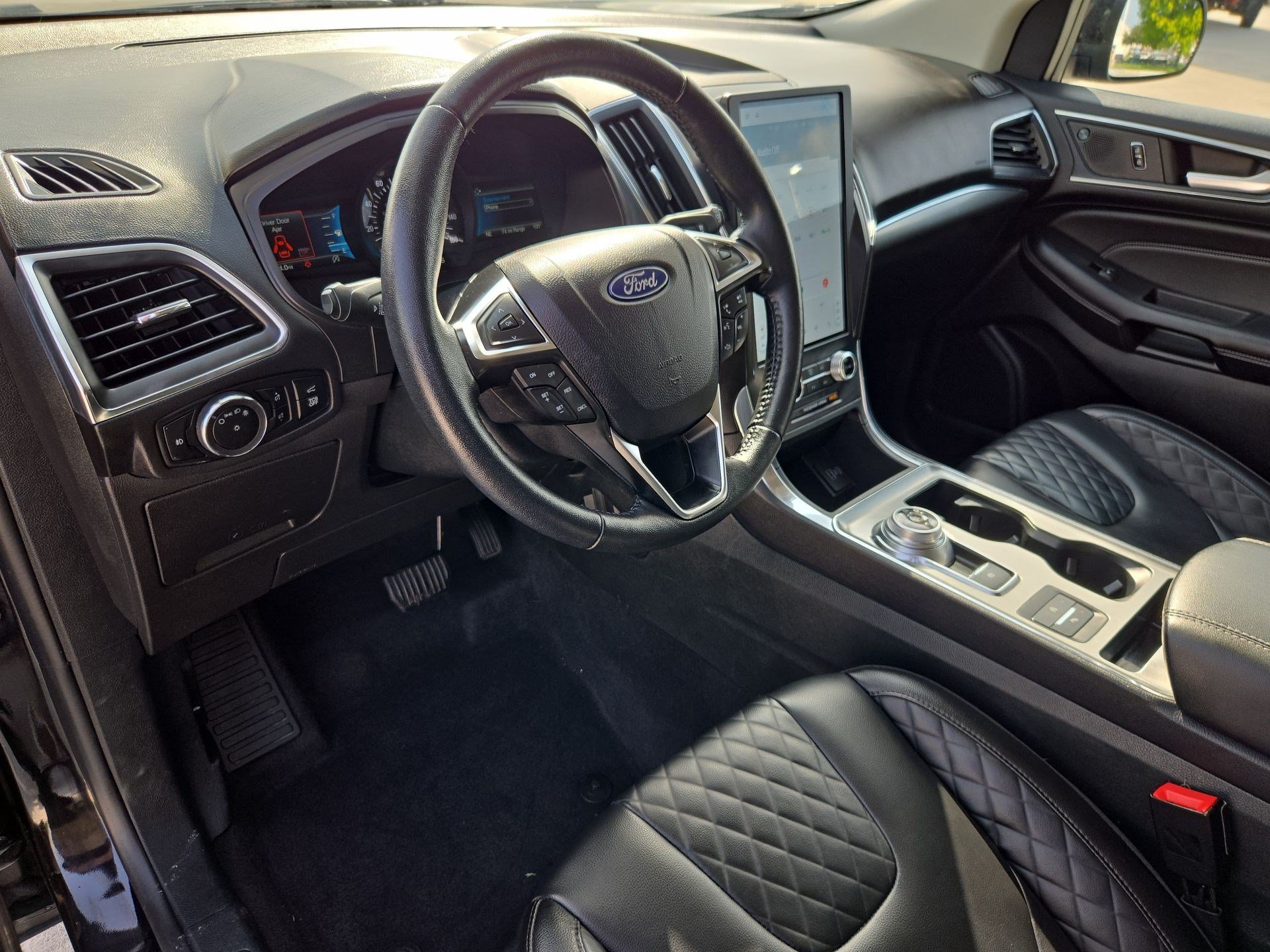 Used 2024 Black Metallic Ford Titanium image 11