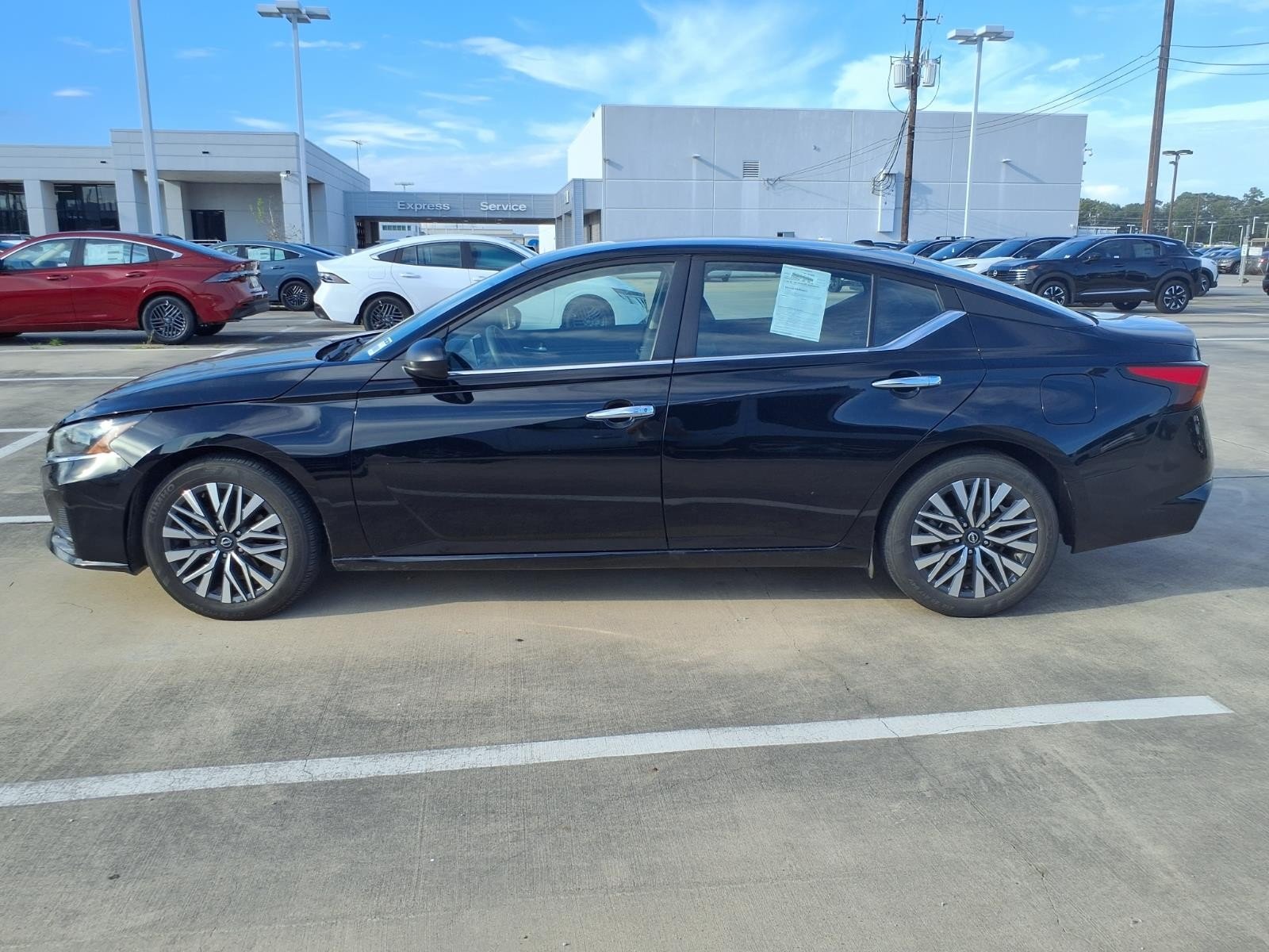 Used 2024 Super Black Nissan 2.5 SV image 16