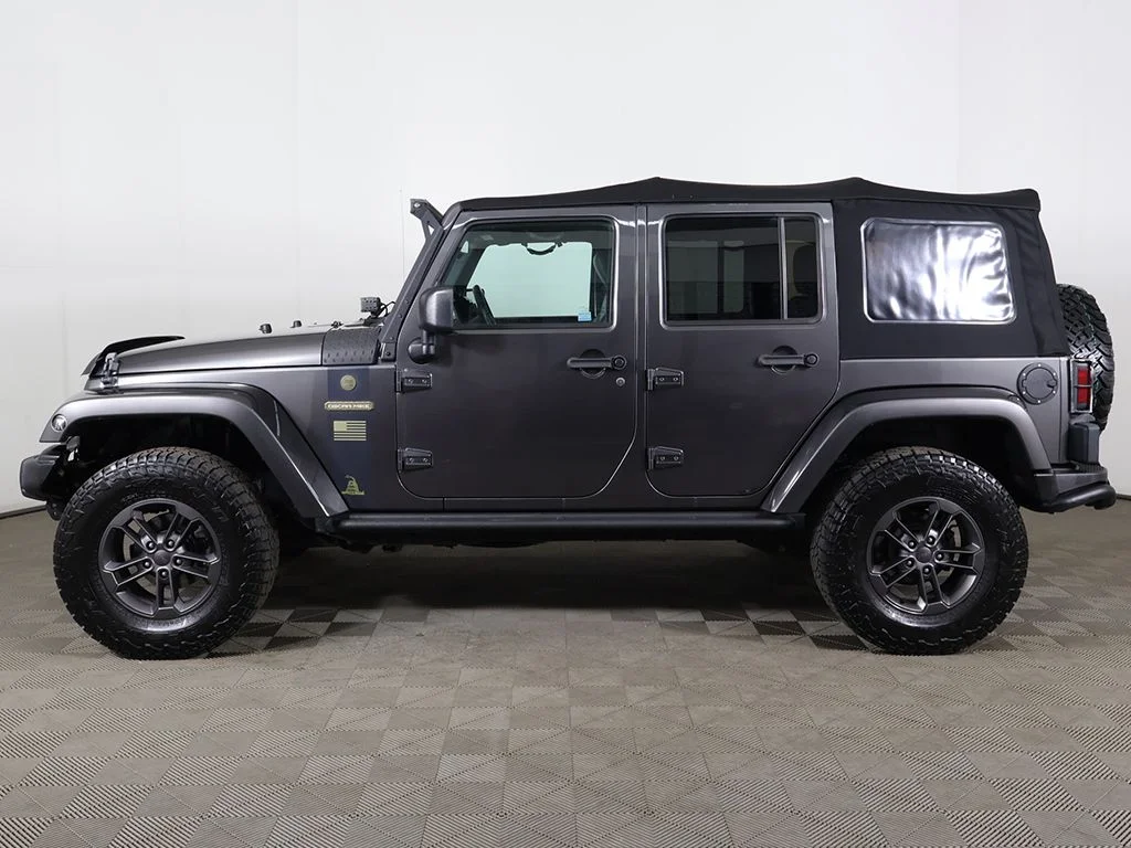 Used 2018 Granite Crystal Metallic Clearcoat Jeep Unlimited Sport image 12