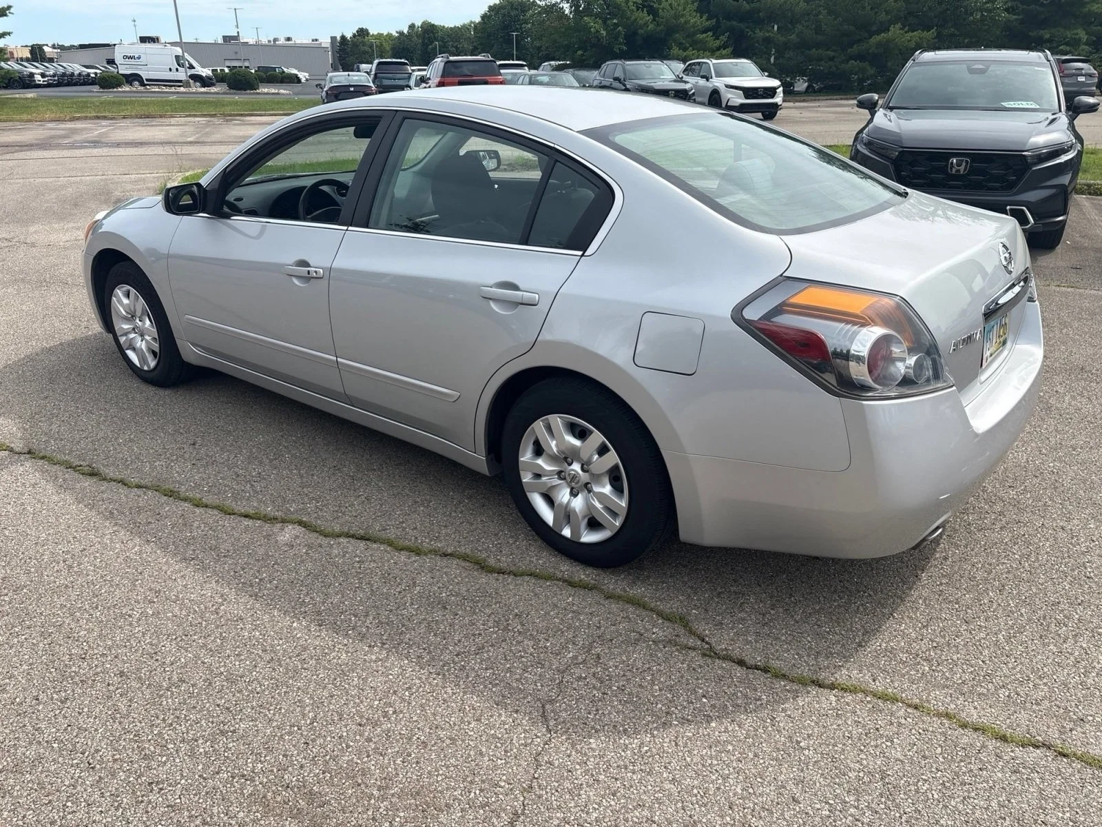 Used 2011 Brilliant Silver Metallic Nissan 2.5 S image 4
