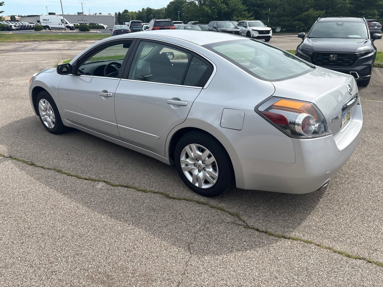 Used 2011 Brilliant Silver Metallic Nissan 2.5 S image 4