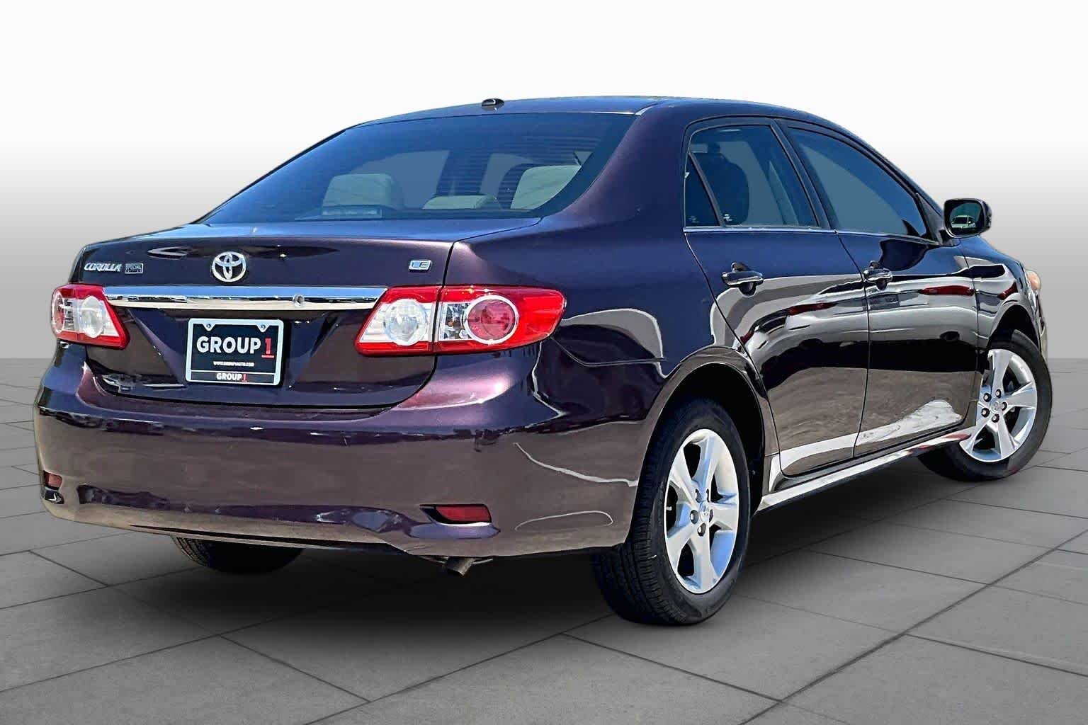 Used 2013 Black Currant Metallic Toyota LE Special Edition image 12