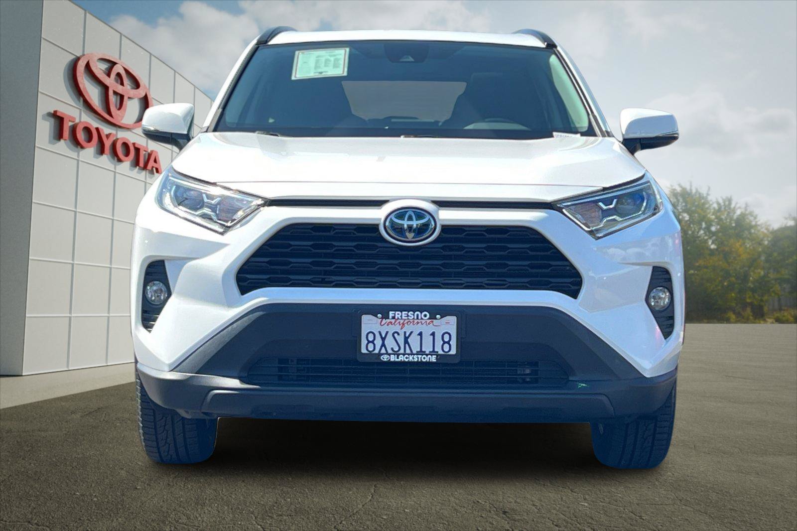 Certified Used 2021 Super White Toyota Hybrid XLE image 8