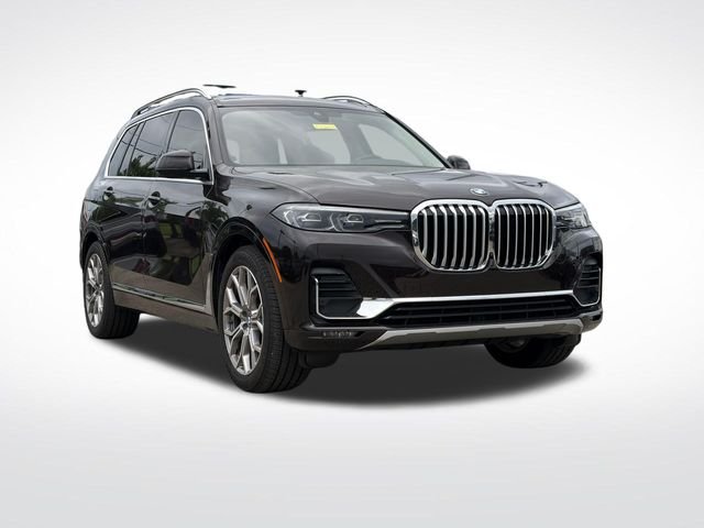 Used 2022 Brown Metallic BMW xDrive40i image 1