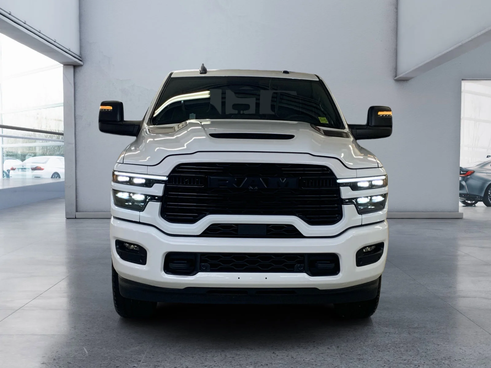 New 2026 Bright White Ram Laramie image 8