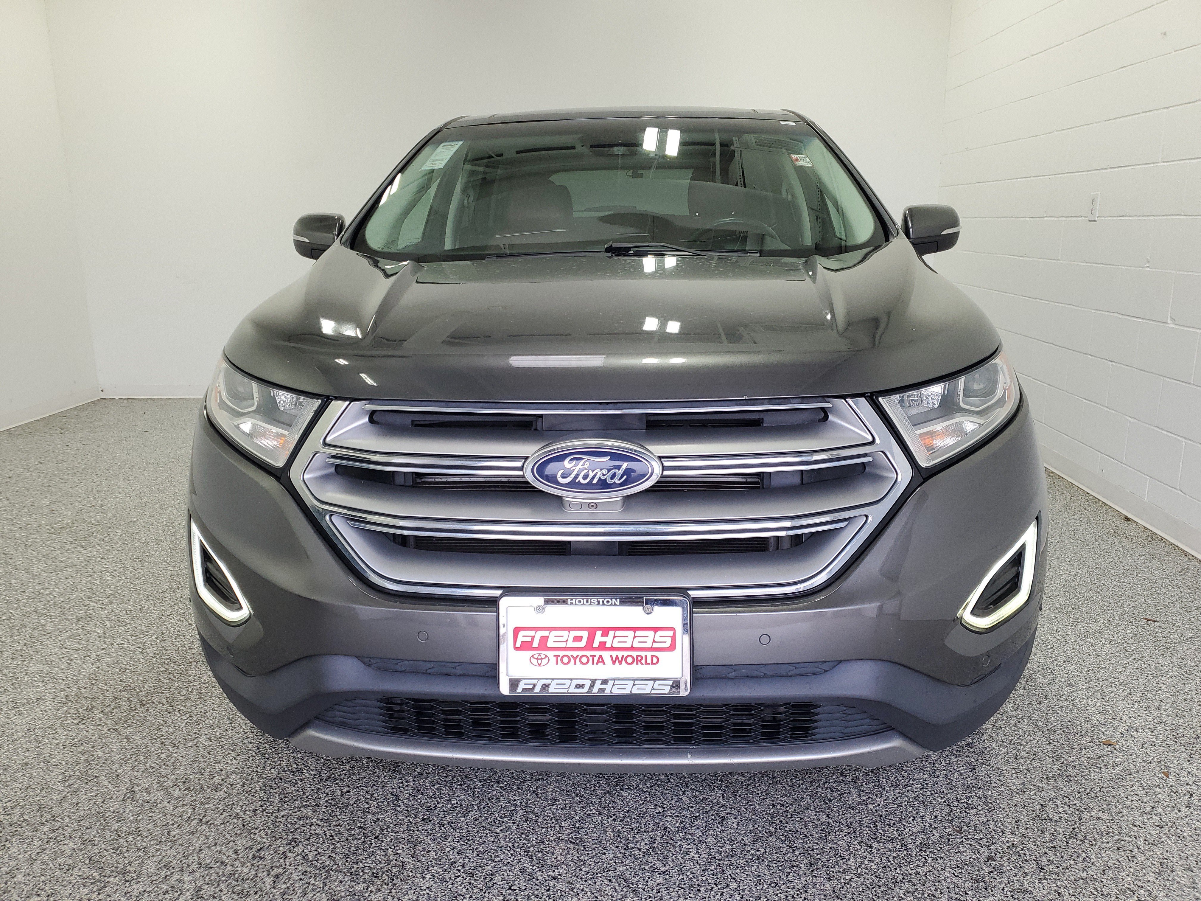 Used 2015 Magnetic Metallic Ford Titanium image 4