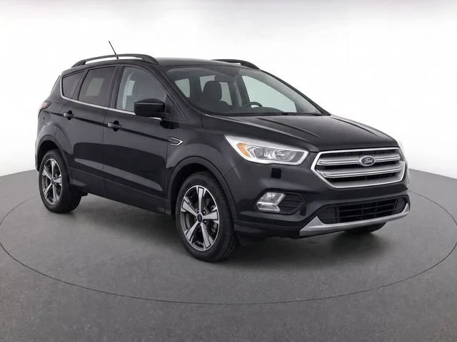 Used 2018 Shadow Black Ford SEL image 1