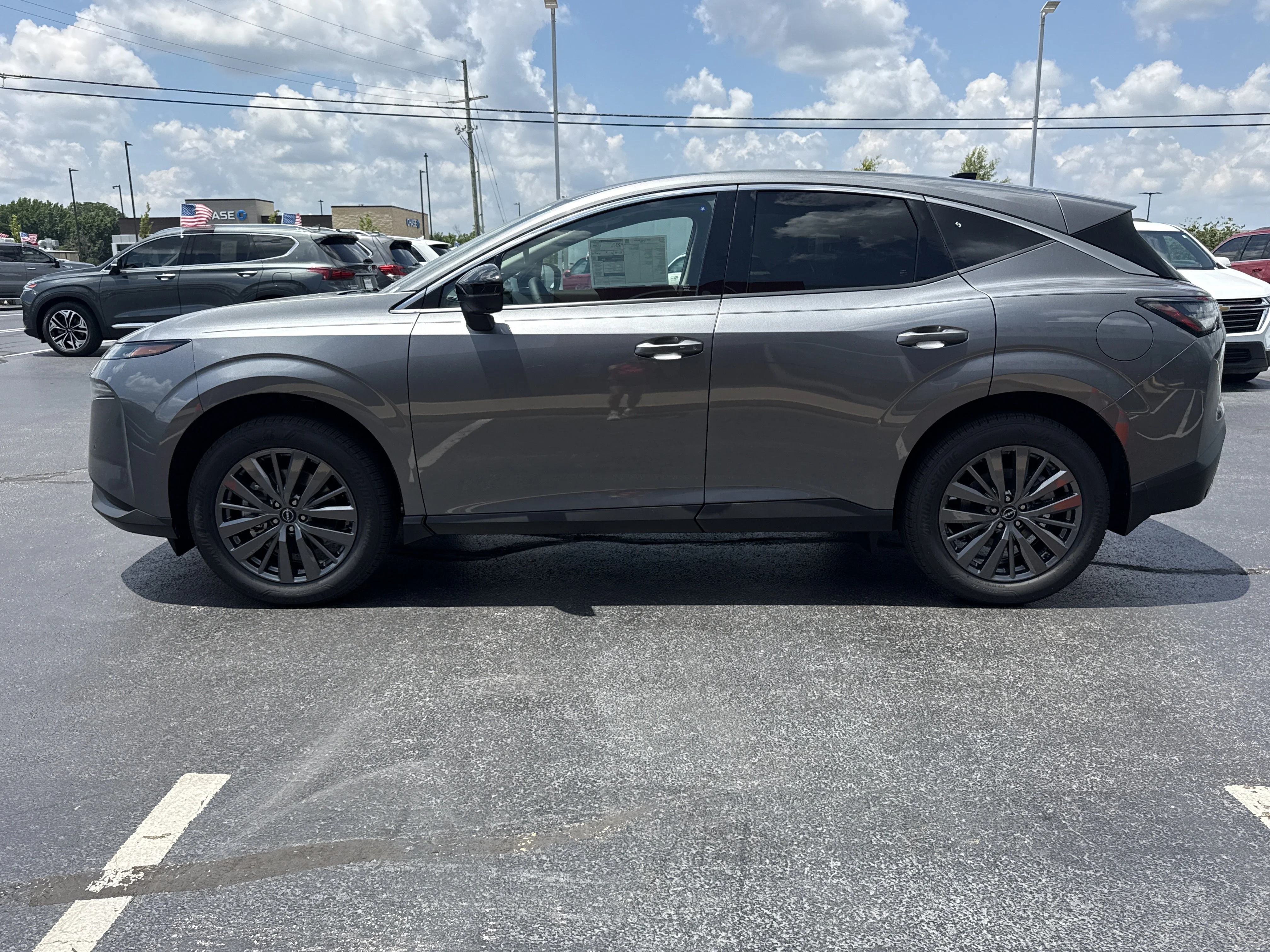 New 2026 Gun Metallic Nissan SL AWD image 8