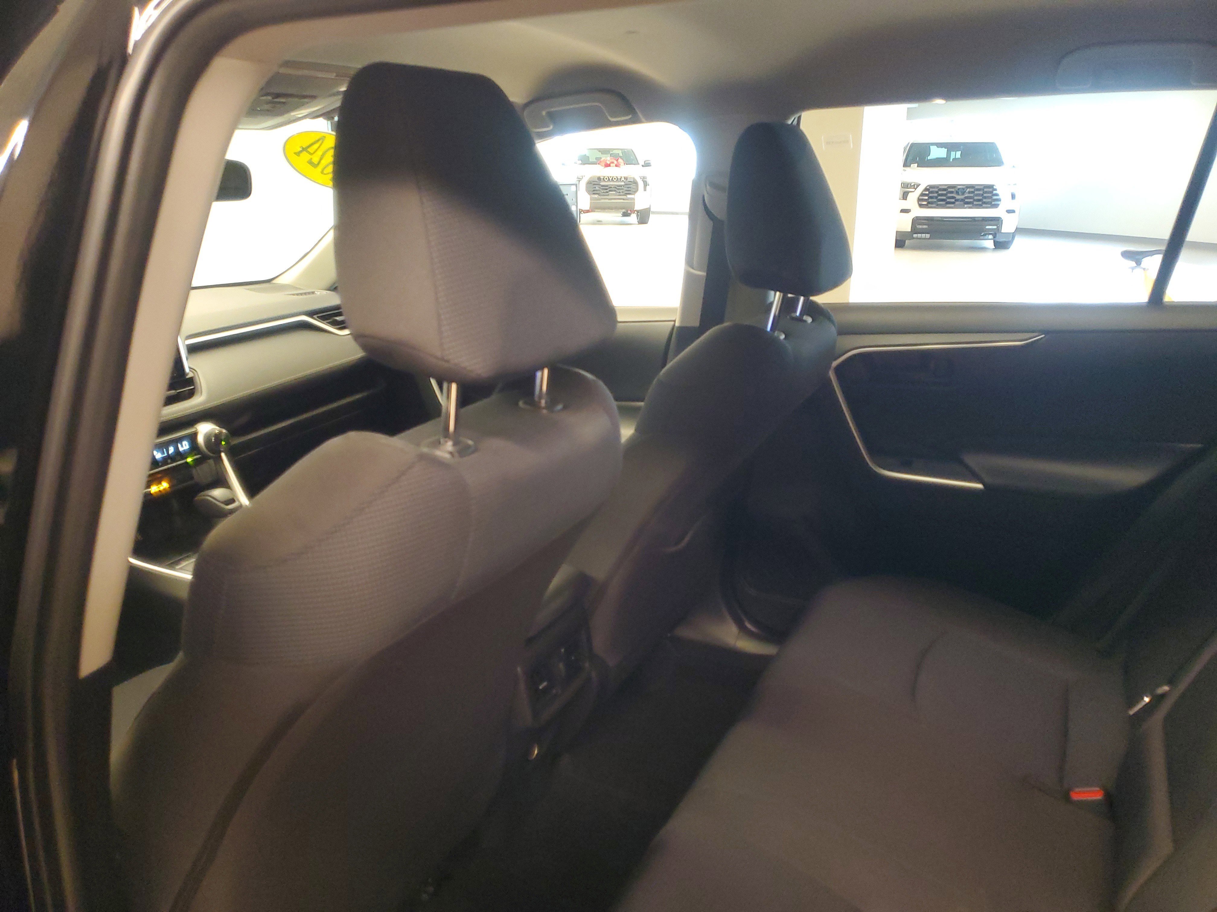 Used 2024 Midnight Black Metallic Toyota Hybrid LE image 11