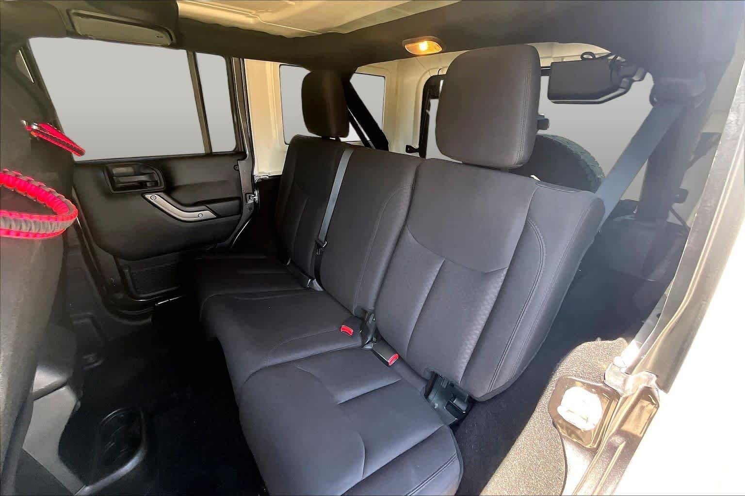 Used 2018 Granite Crystal Metallic Clearcoat Jeep Sport S image 17