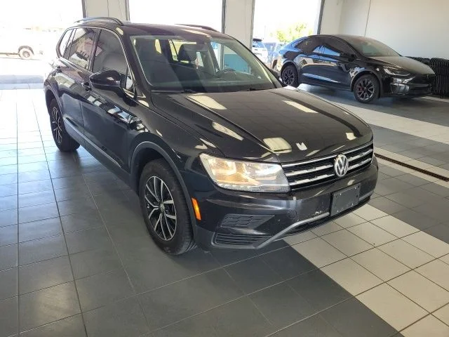 Used 2021 Deep Black Volkswagen 2.0T SE image 1