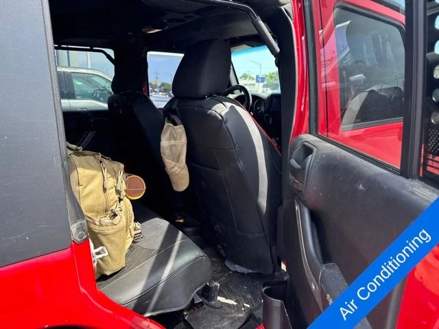 Used 2015 Firecracker Red Jeep Unlimited Sport image 7