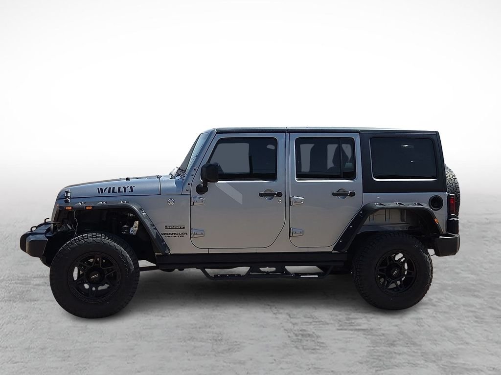 Used 2016 Billet Silver Metallic Clearcoat Jeep Unlimited Sport image 6