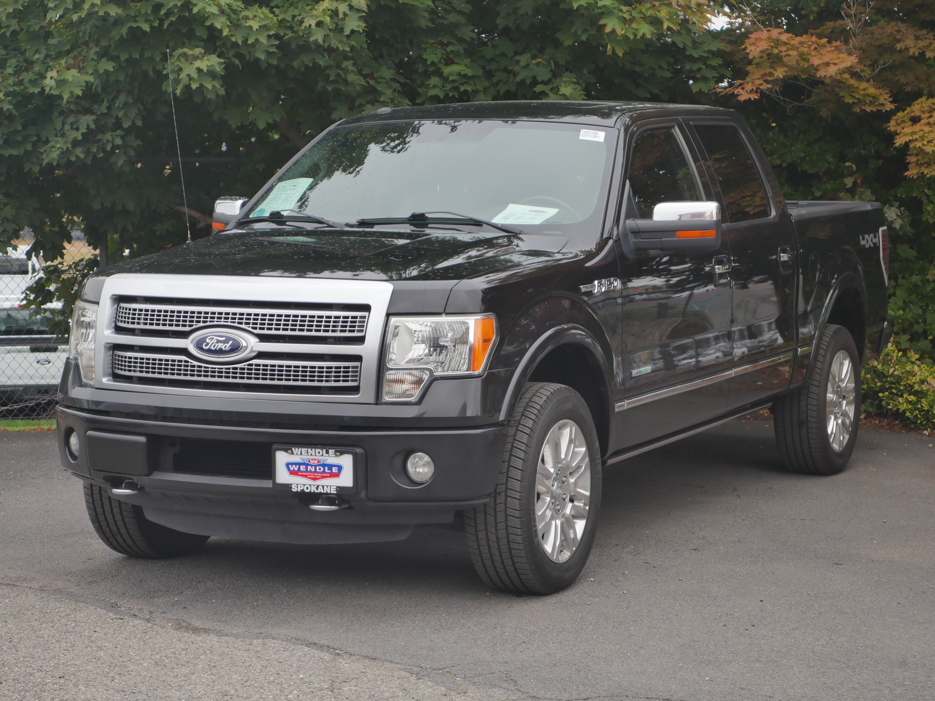 Used 2012 Tuxedo Black Metallic Ford Platinum image 1