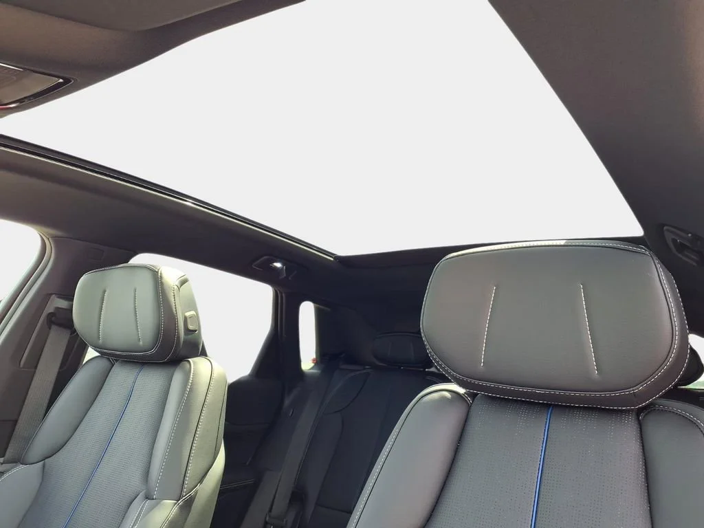 New 2026 Vibrant White Tricoat Cadillac Sport image 17