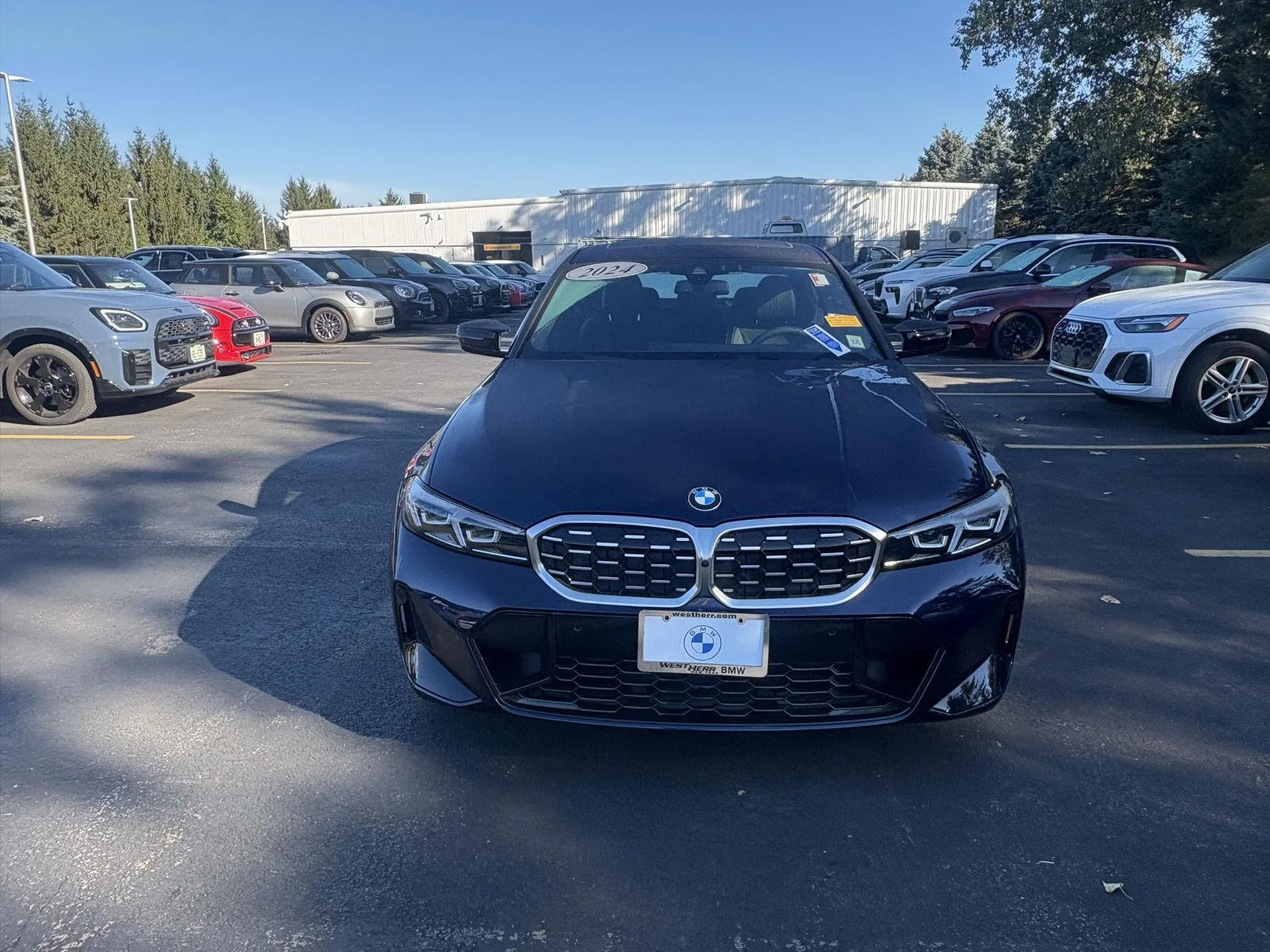 Used 2024 Tanzanite Blue II Metallic BMW M340i xDrive image 2