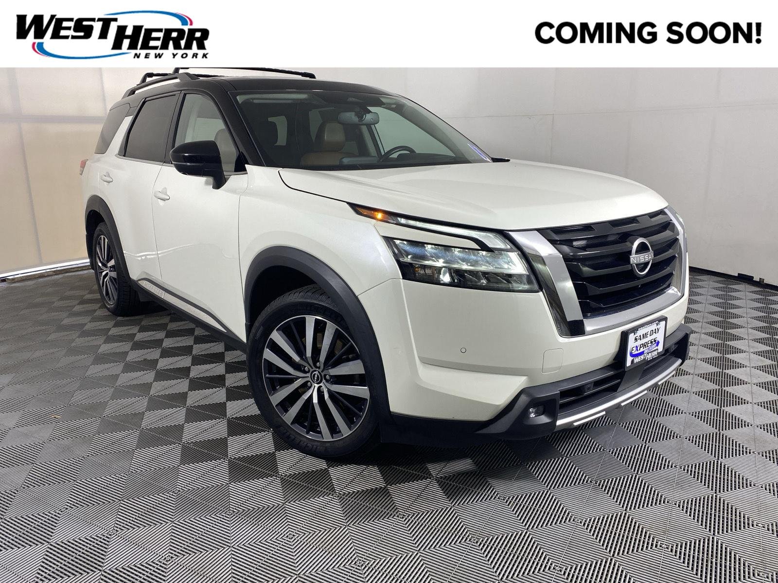 Used 2022 Pearl White Tricoat/Super Black Nissan Platinum image 1