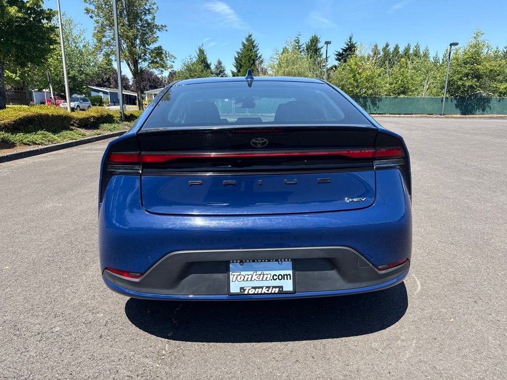 Used 2025 Reservoir Blue Toyota LE image 6