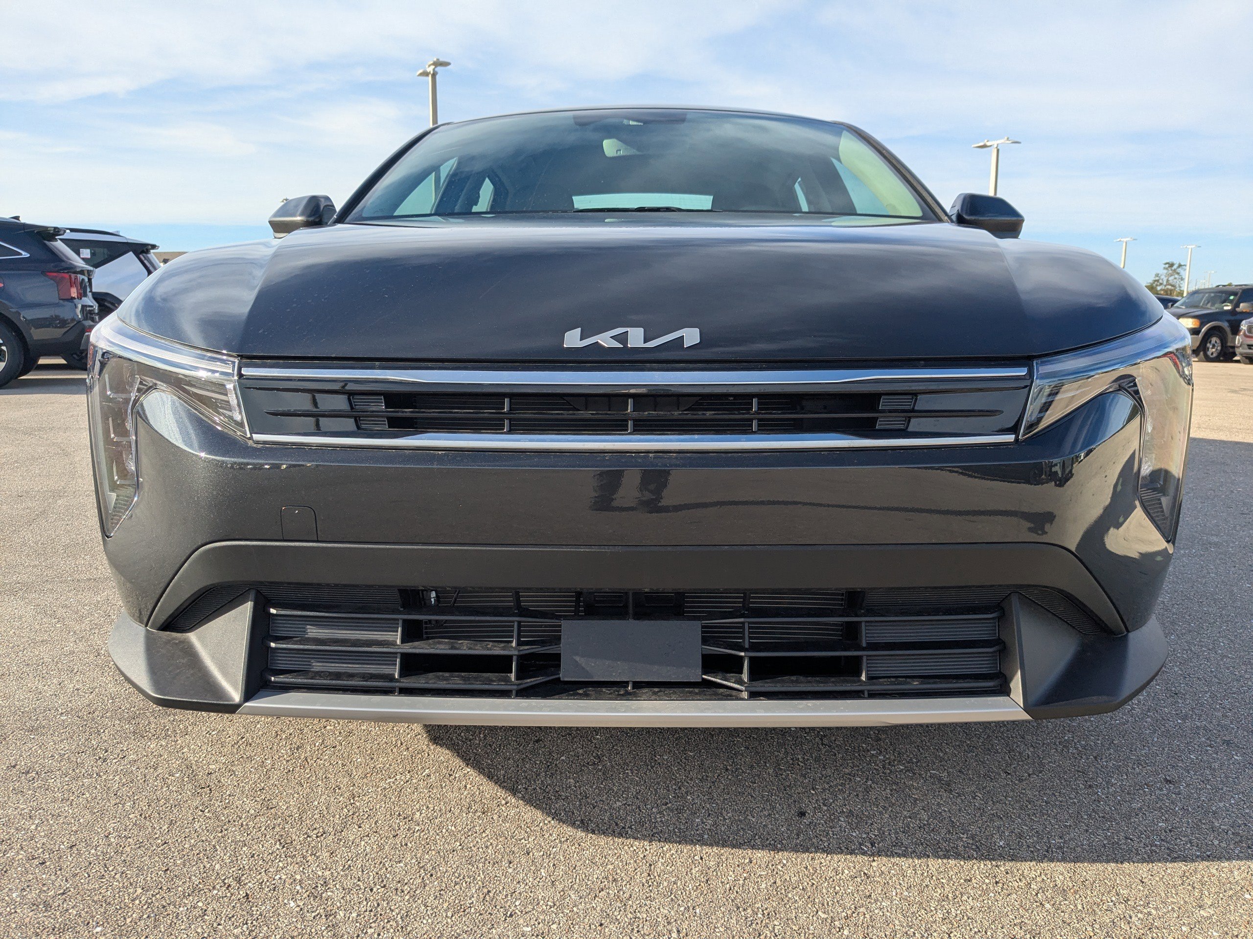 New 2025 Interstellar Gray Kia EX image 3
