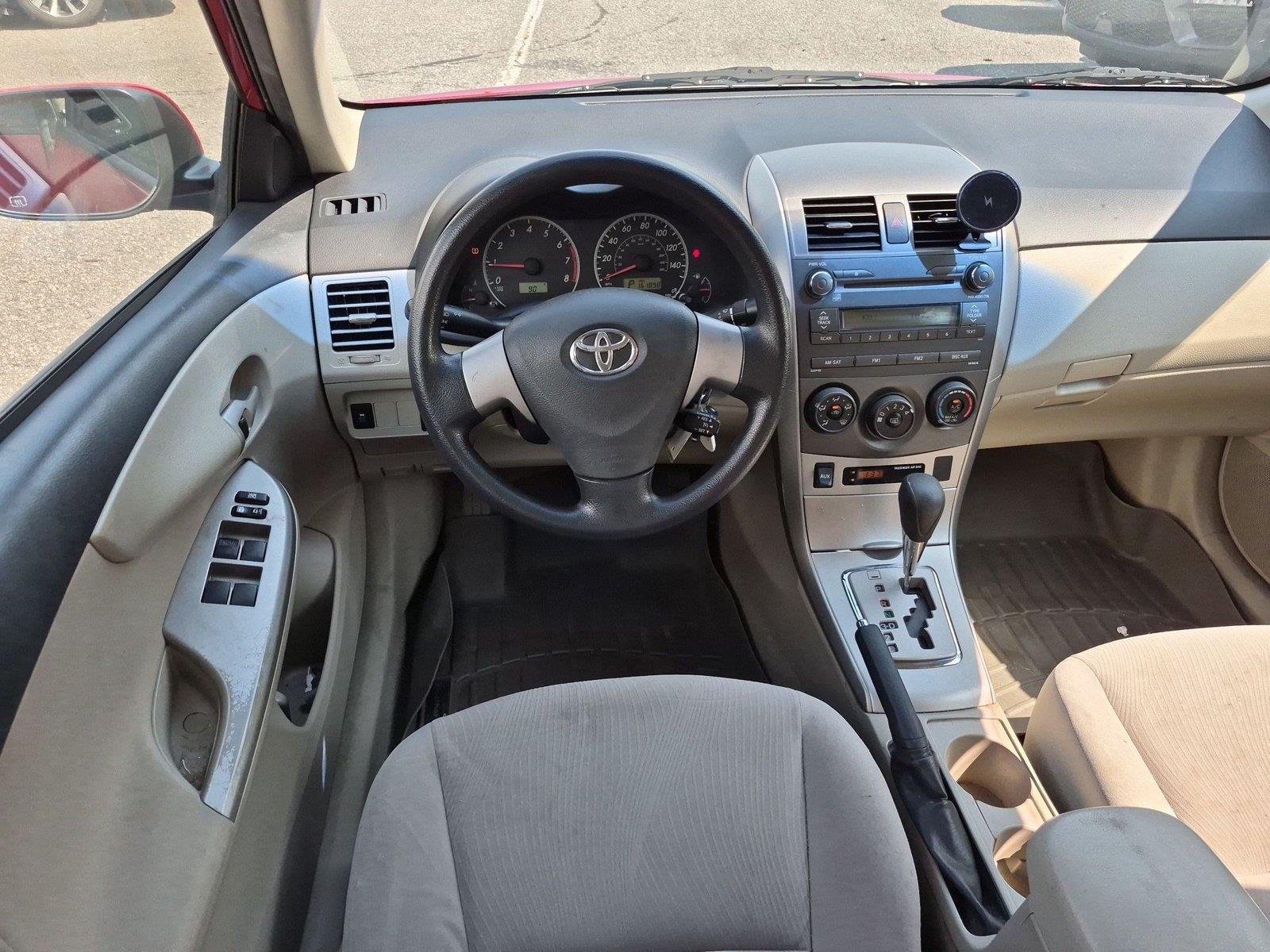 Used 2011 Barcelona Red Metallic Toyota LE image 27
