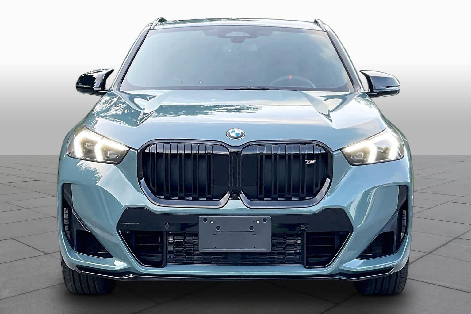 Used 2026 Cape York Green Metallic BMW M35i image 3