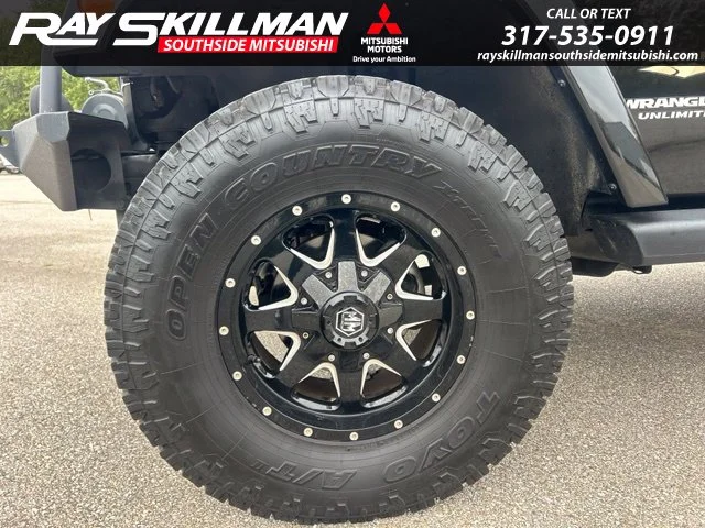 Used 2014 Black Jeep Unlimited Sahara image 9