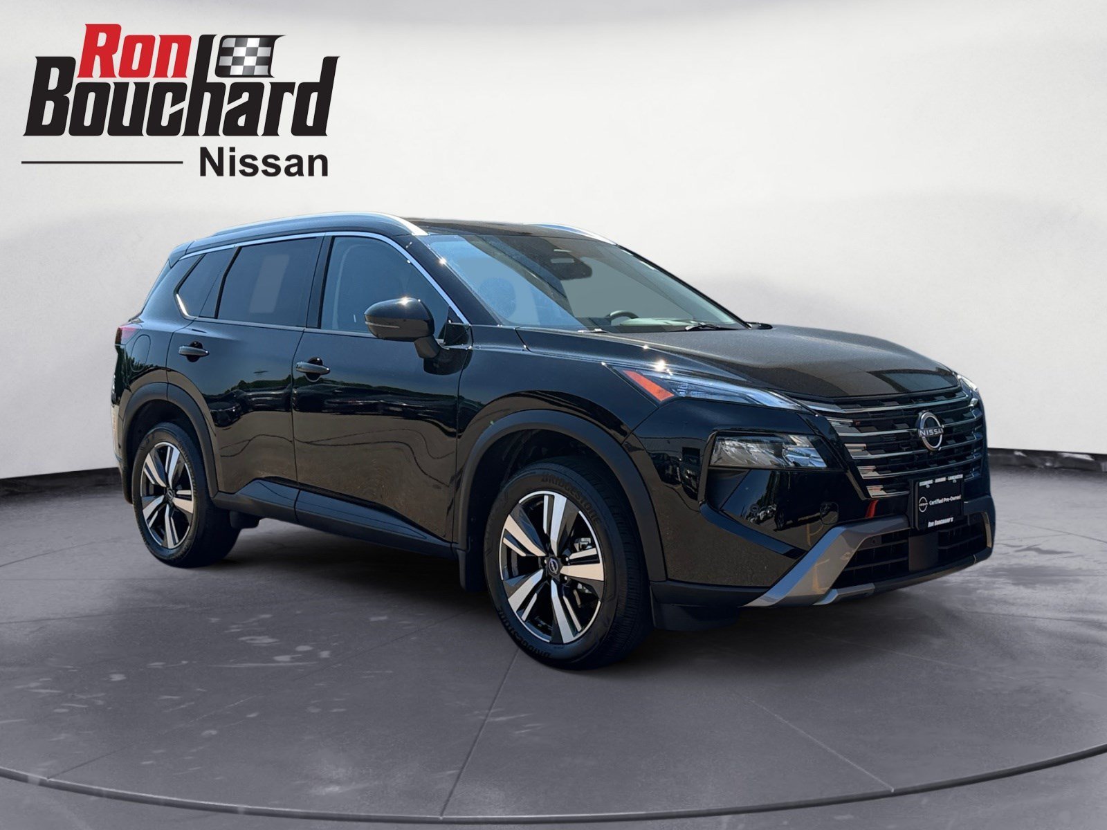 Used 2025 Super Black Nissan SL image 1
