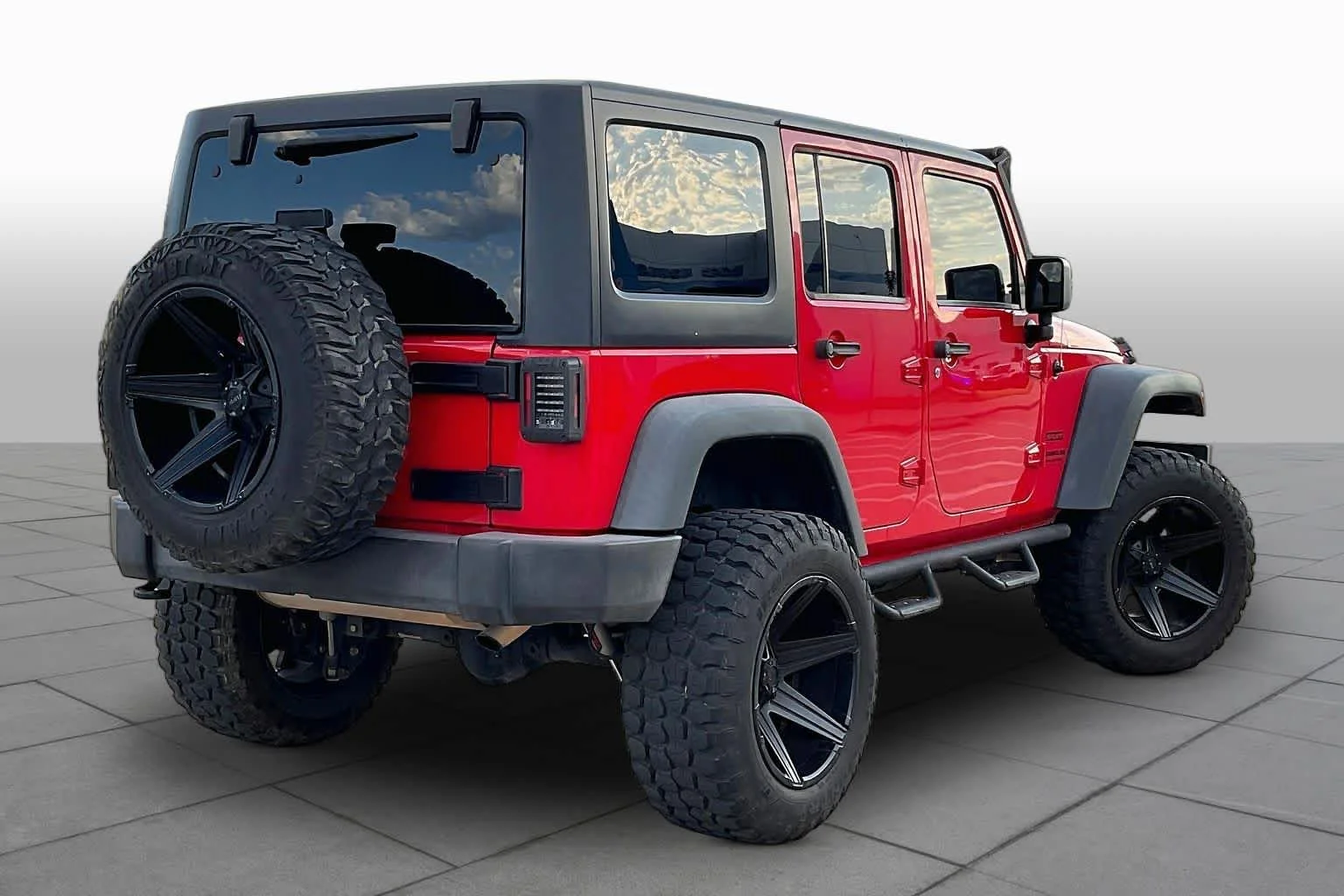 Used 2015 Firecracker Red Clear Coat Jeep Sport image 12