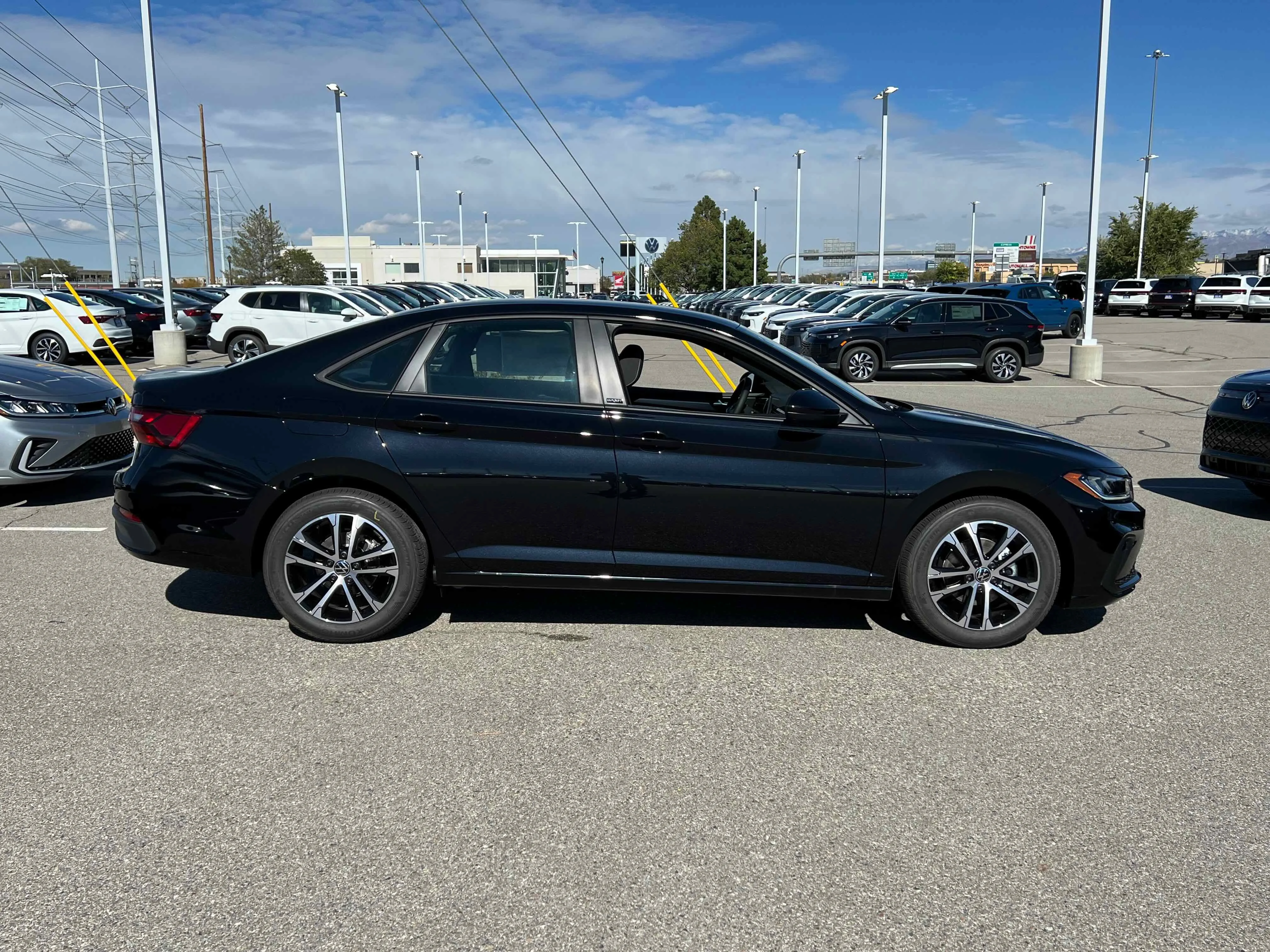 New 2026 Black Volkswagen Sport image 2