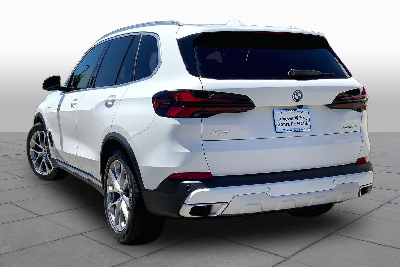 New 2026 Alpine White BMW xDrive50e image 12