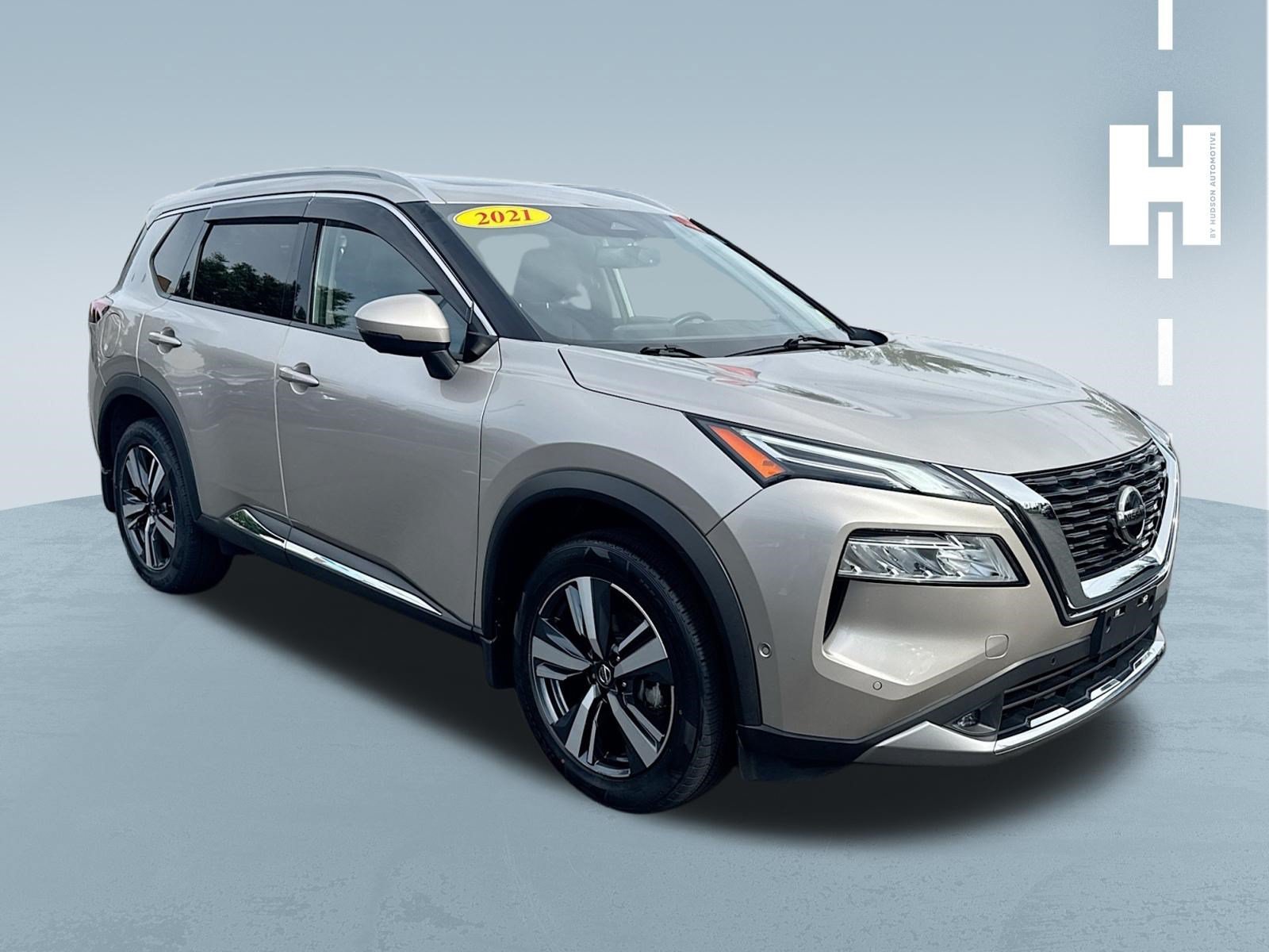 Used 2021 Champagne Silver Metallic Nissan Platinum image 1